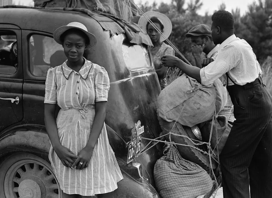 Group of Florida migrants near Shawboro, North Carolina, on their way to Cranberry, New Jersey, to pick potatoes. Photograph by Jack Delano, July 1940.